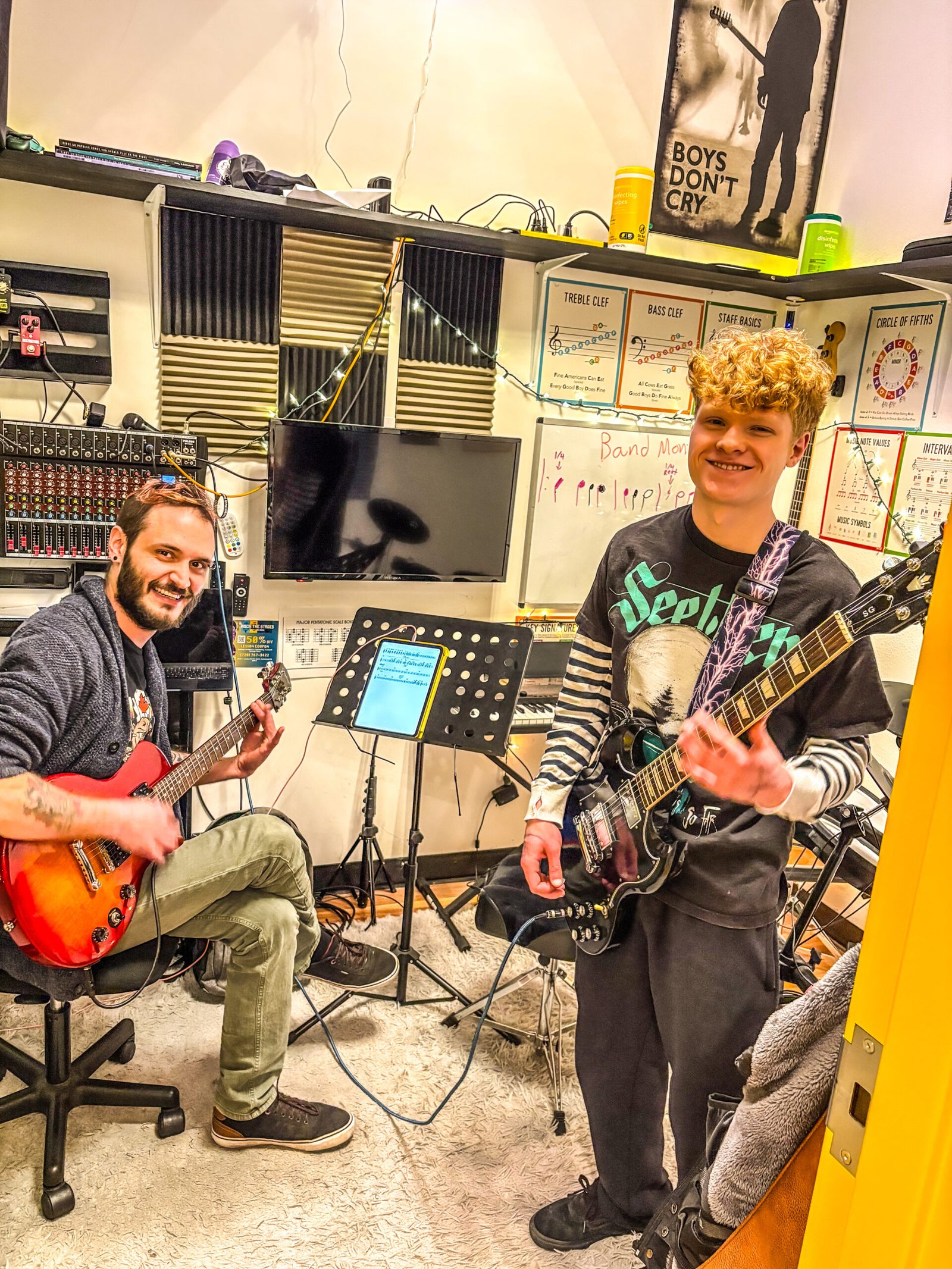 Guitar Students Taking Guitar Lessons From A Local Guitar Teacher Teenage Guitar Student At Rock The Stages Music School in Aurora/Centennial