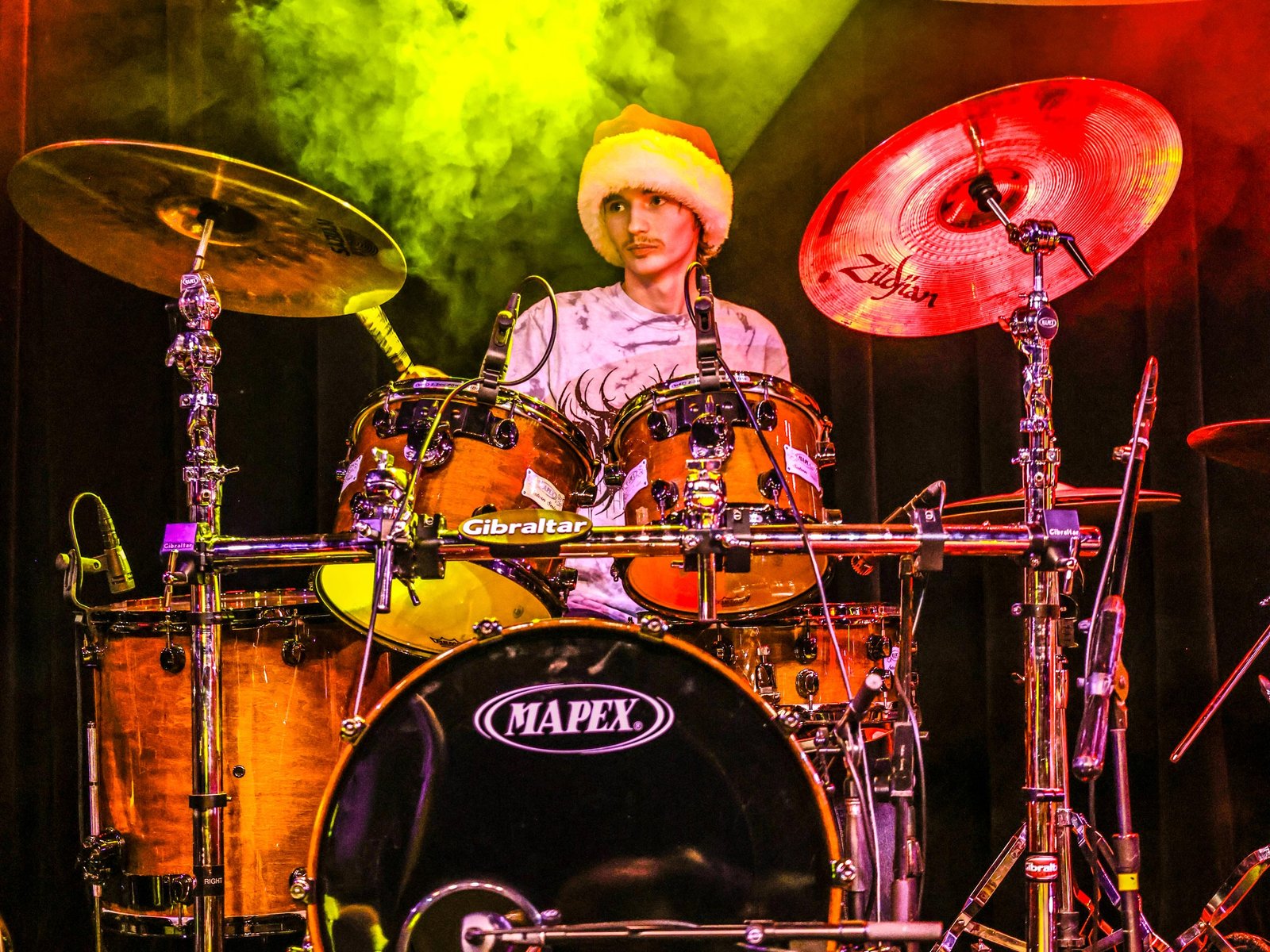 Drum Students Taking Drum Lessons From A Local Drum Teacher Teenage Drum Student At Rock The Stages Music School in Aurora/Centennial Performing Live On Stage
