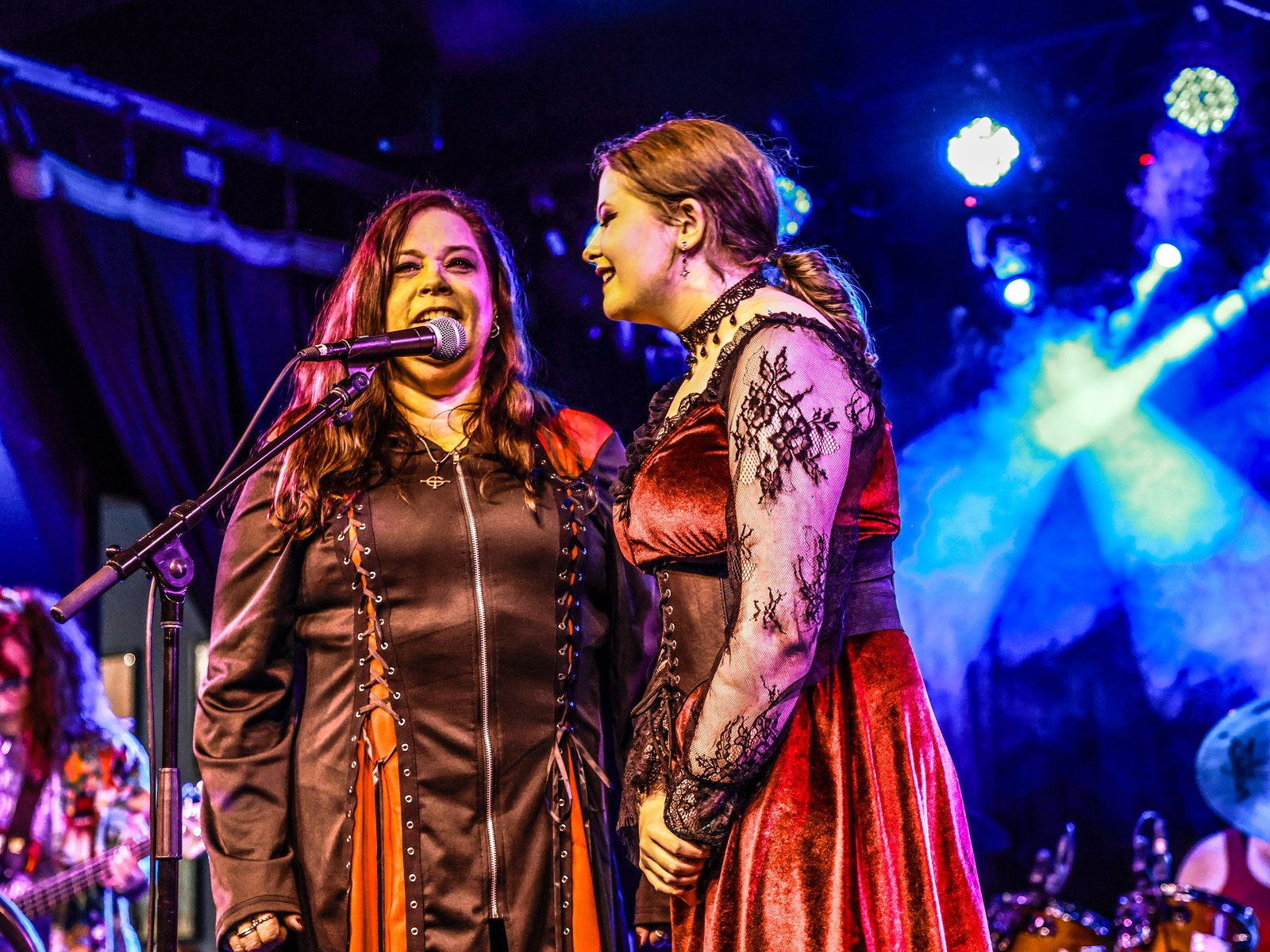 Singing Students Taking Singing Lessons From A Local Music Teacher Teenage & Adult Singing Student At Rock The Stages Music School in Aurora/Centennial Performing Live On Stage