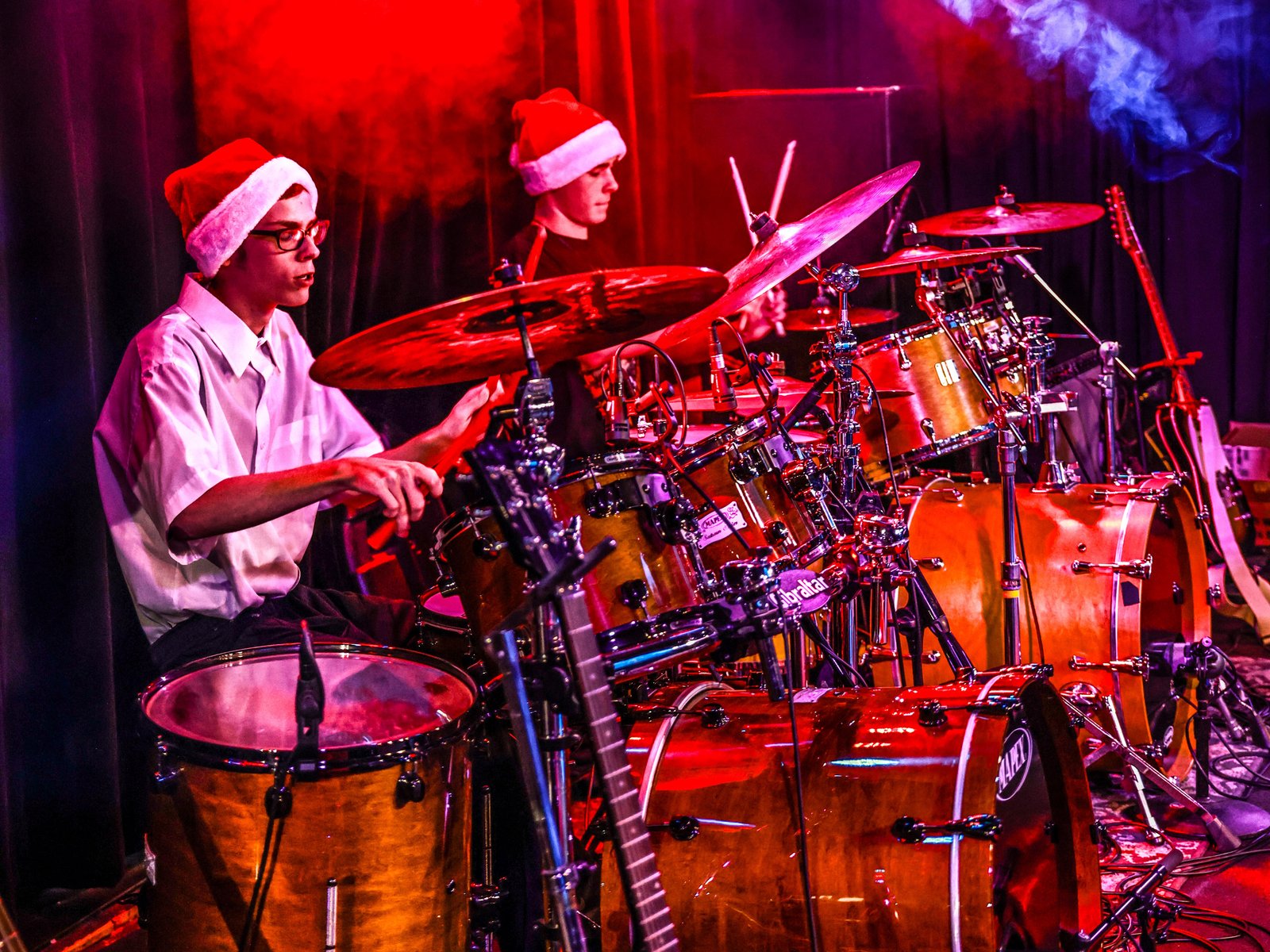 Drum Students Taking Drum Lessons From A Local Drum Teacher In Aurora/Centennial Teenage Drum Students At Rock The Stages Music School in Aurora/Centennial Performing Live On Stage