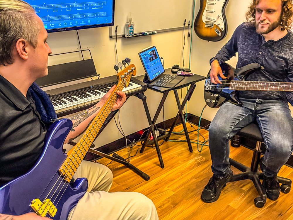 Bass Guitar Students Taking Bass Guitar Lessons From A Local Bass Guitar Teacher Adult Bass Guitar Student At Rock The Stages Music School in Aurora/Centennial
