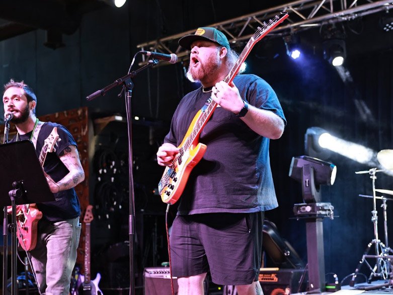 Bass Guitar Student Taking Bass Guitar Lessons From A Local Bass Guitar Teacher Adult Bass Guitar Student At Rock The Stages Music School in Aurora/Centennial Performing Live On Stage
