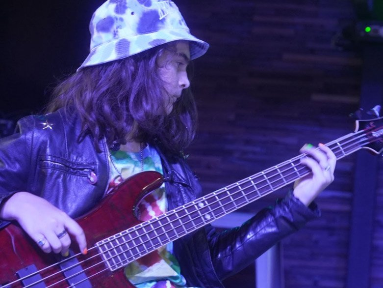 Bass Guitar Student Taking Bass Guitar Lessons From A Local Bass Guitar Teacher Teenager Bass Guitar Student At Rock The Stages Music School in Aurora/Centennial Performing Live On Stage