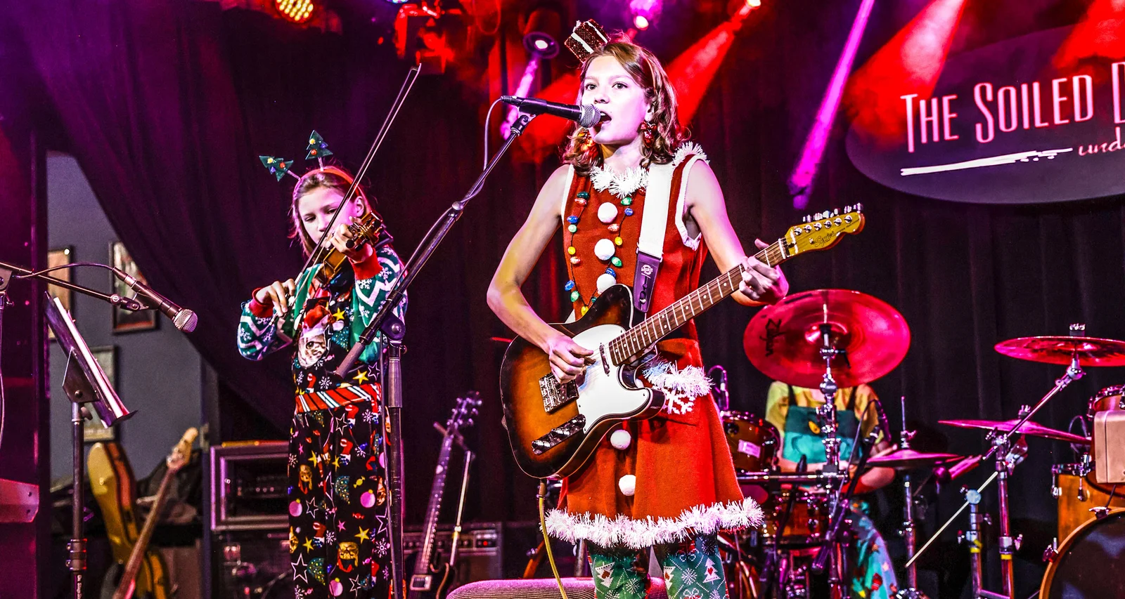 students learning pop and rock music